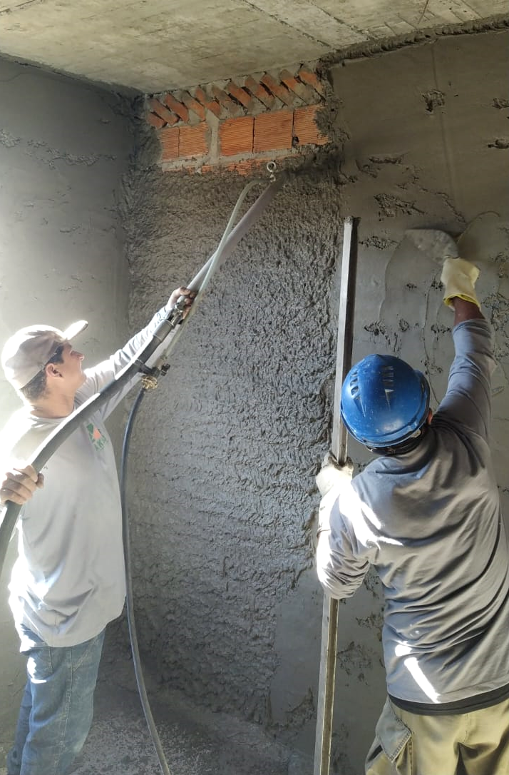 Reboco Parede com reboco projetado e manual